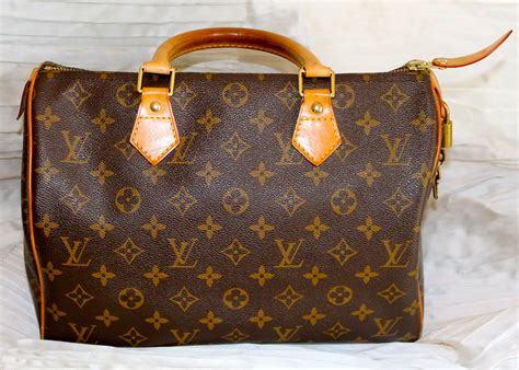 borsa lv bauletto due tasche davanti|louis vuitton borse in pelle.